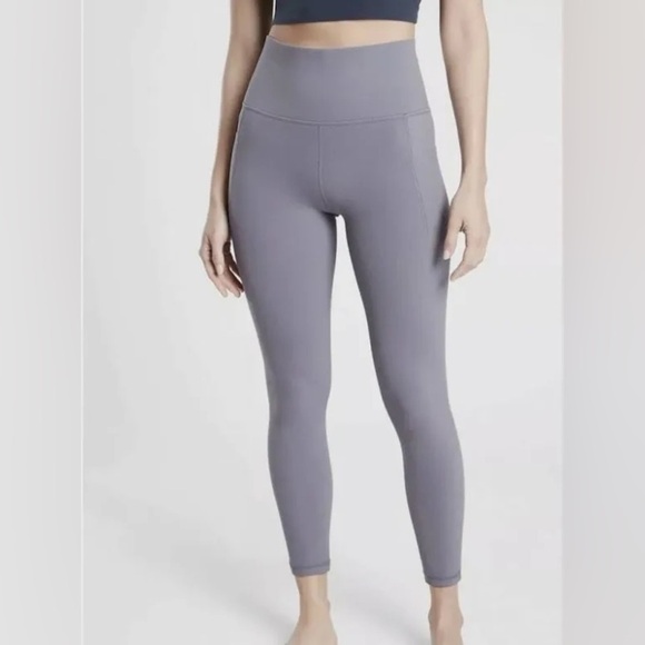 Athleta Salutation stash pocket II 7/8 Tight Leggings Size L - Picture 1 of 7